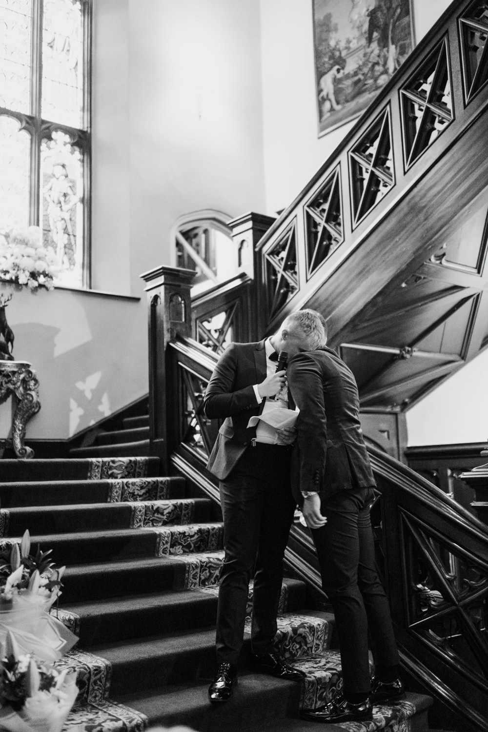 raw documetary emotional moment between groom and brother at the wedding in markree castle