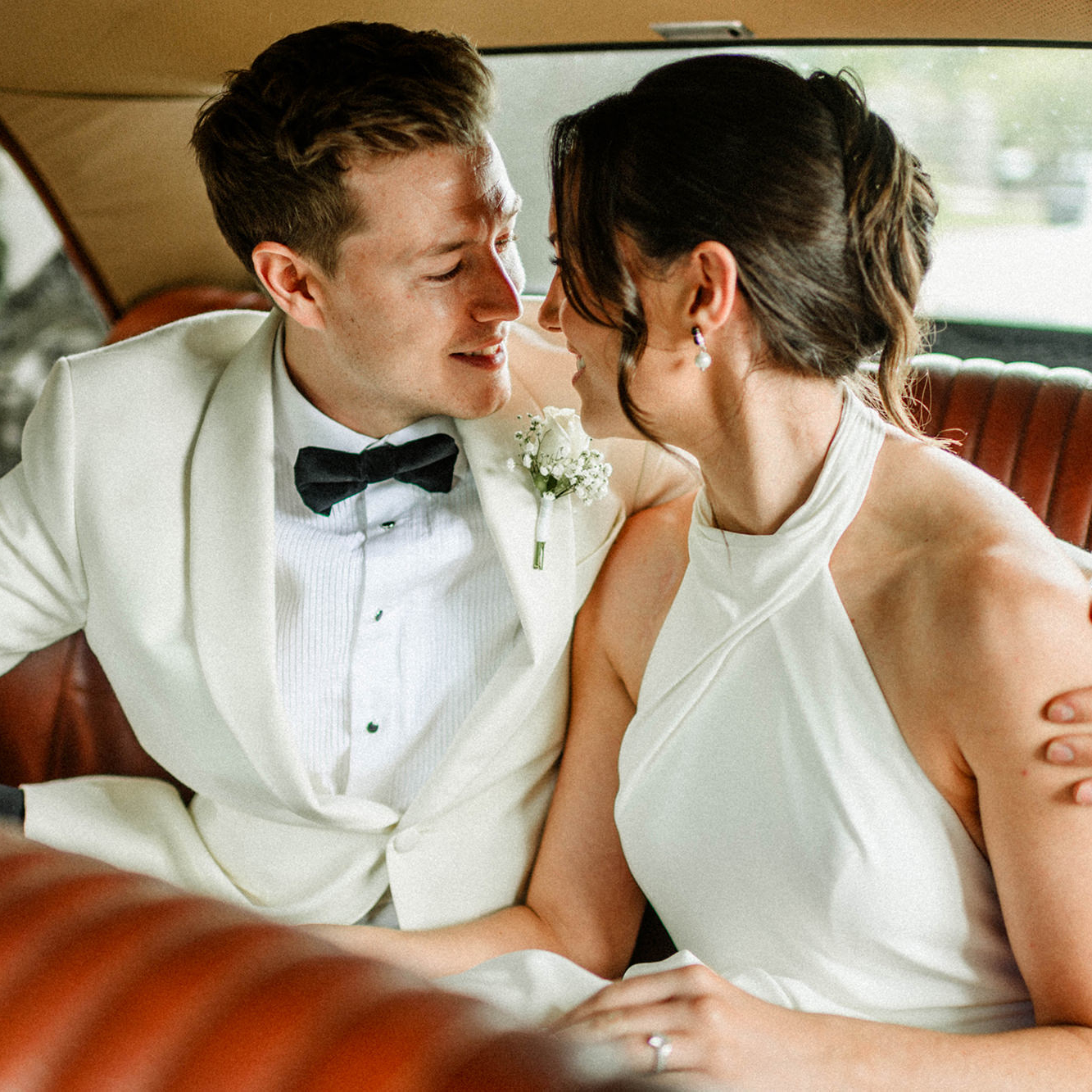 maried couple inside wedding car at wedding in sligo