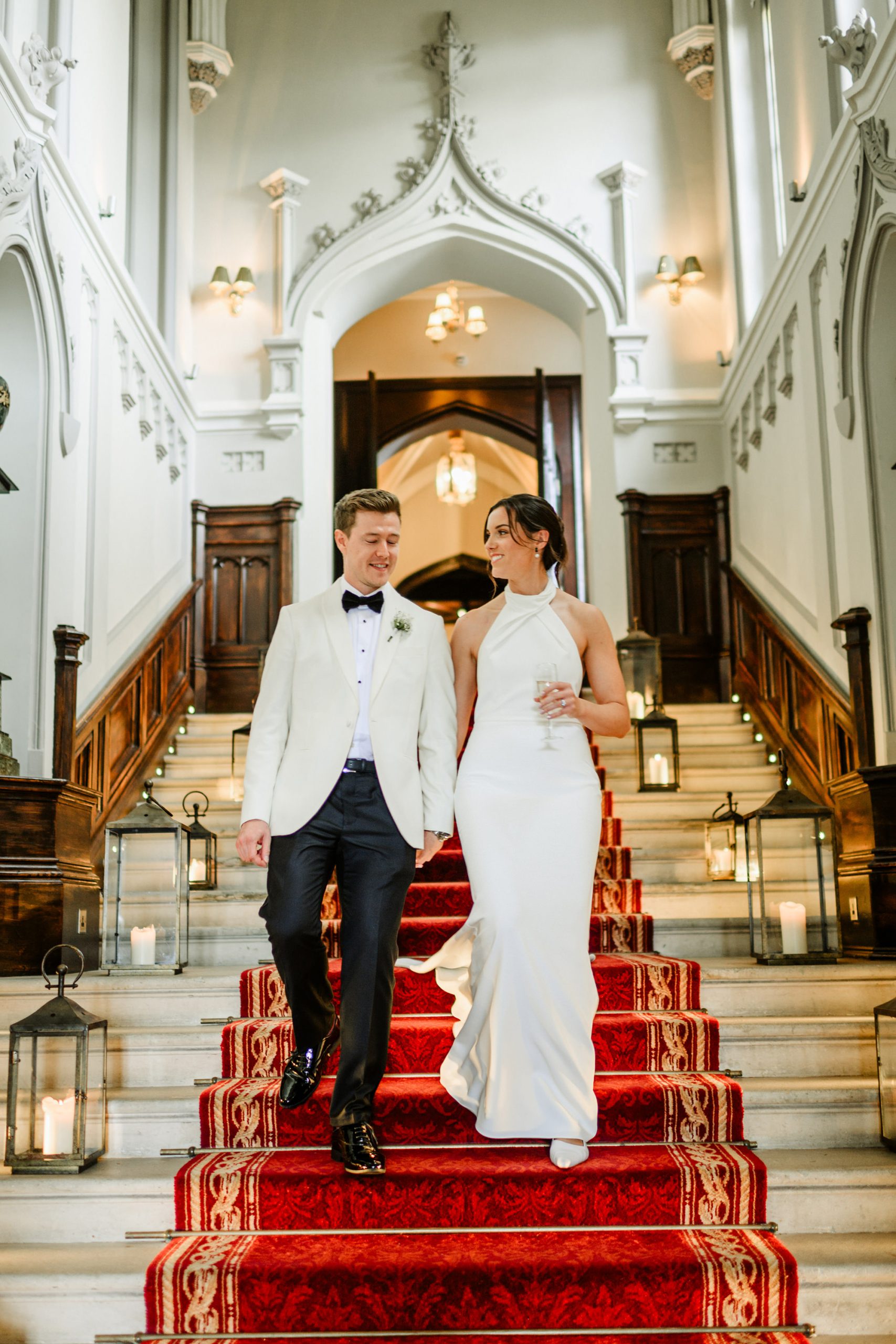 famous stairs in markree casle with couples walking down