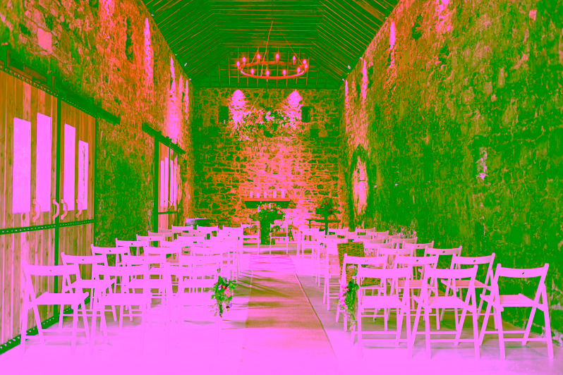 decorated ceremony room in barn ready for wedding in Juniper Barn near Sligo