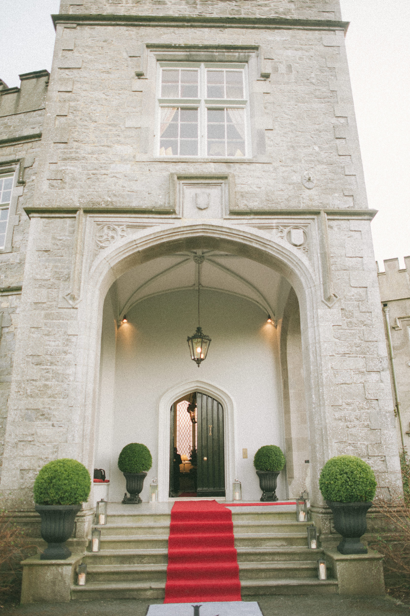 red carpet for wedding guests at front stairs inLuttrellstown castle near Dublin