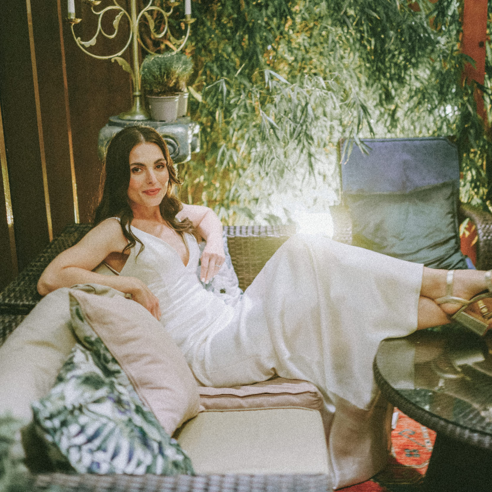 bride on sofa in dublin city wedding venue marco pierre white